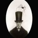 Illustration for article titled Portraits of proper Victorians with their pet troll heads and yetis